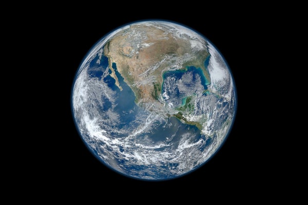 Satellite image of Earth on black.