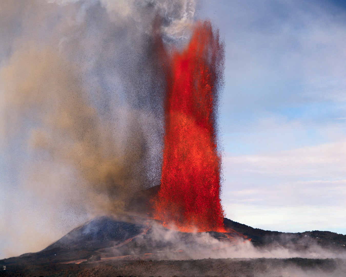 What Causes a Volcano to Erupt, and How Do Scientists Predict Eruptions