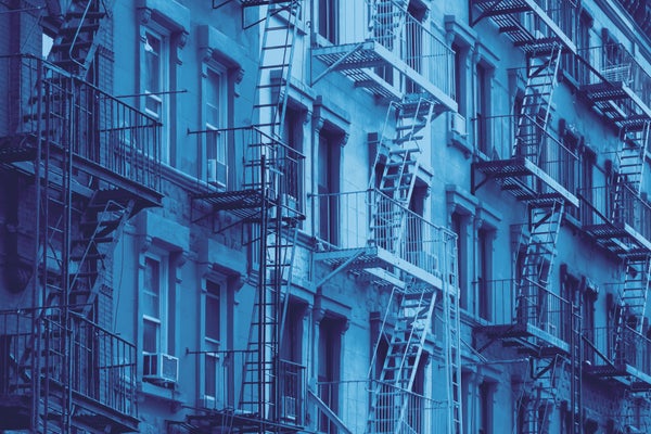 a row of tinted blue buildings