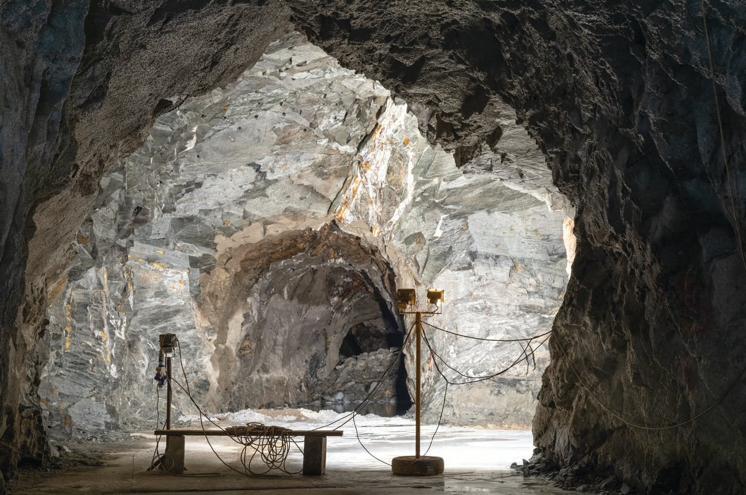 Wide view showing some equipment in a cave.