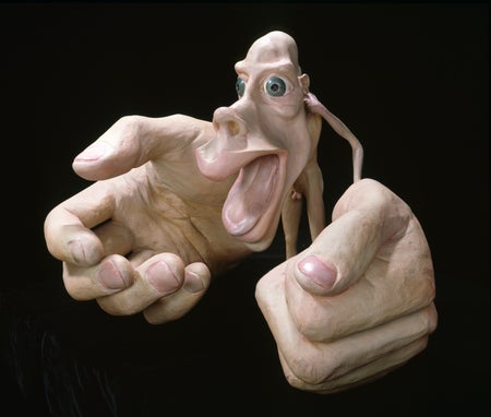 Tiny figure with skinny arms and enormous hands