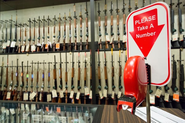 "Take a Number" tickets at a gun shop