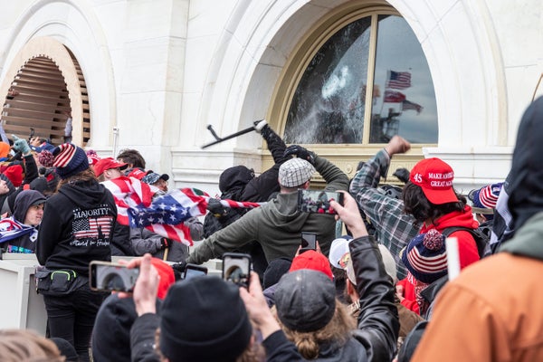 Pro-Trump protesters break windows of the Capitol building. Rioters broke windows and breached the Capitol building in an attempt to overthrow the results of the 2020 election.