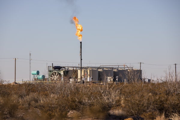 A flare burns off excess natural gas near Monahans, Texas, U.S., on Friday, Jan. 28, 2022.