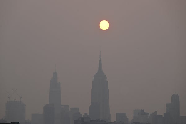 Sun rises in smoky sky in New York City because of Canadian wildfires