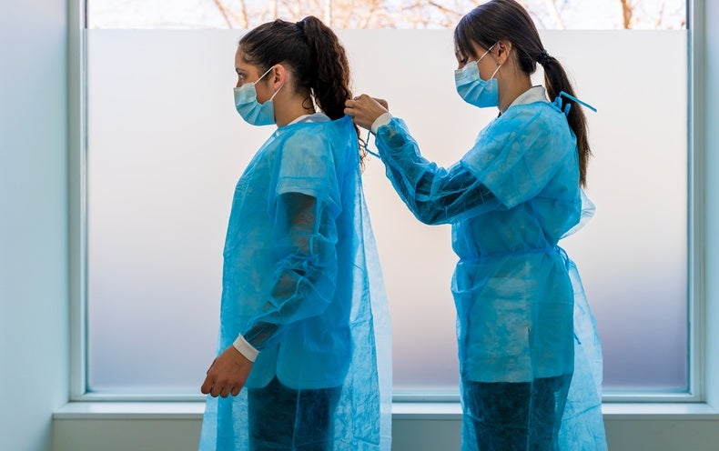 Disposable Healthcare facility Robes Could Expose Well being Workers to Infection