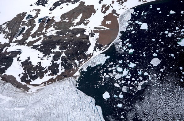 An aerial view of Antarctica and sea ice