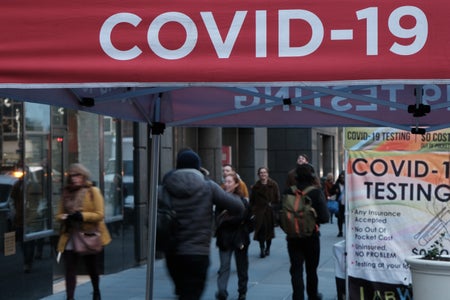 A COVID-19 testing site stands on a sidewalk in Midtown Manhattan.