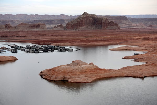 Low water levels are visible at the Wahweap Marina at Lake Powell on March 28, 2022 in Page, Arizona.