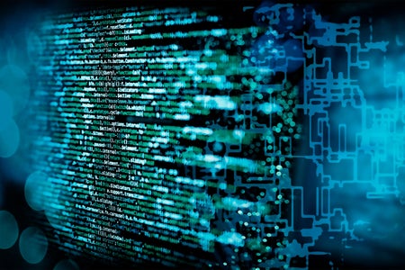 Programming code with abstract technical background in blue