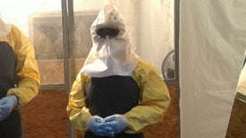 Working in an Ebola Protection Suit