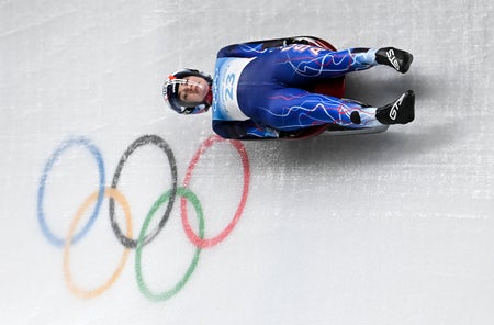 Athlete competing at luge event