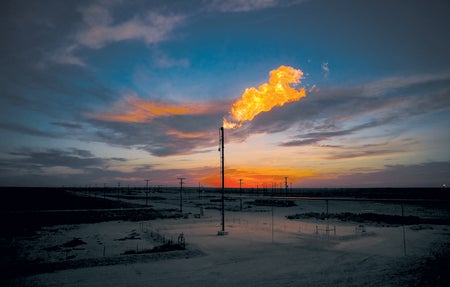 Natural gas, primarily methane, is burned at a Texas oil well.