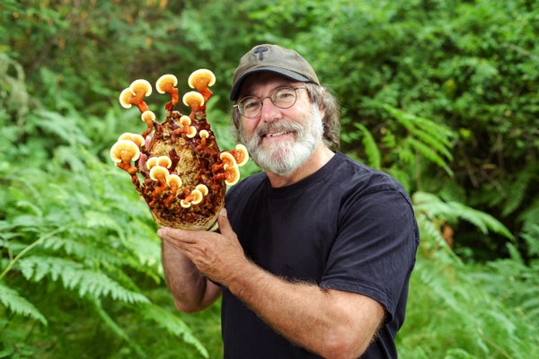 Paul Stamets holds a fungi sample.