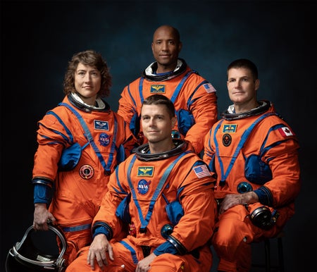 The crew of NASA's Artemis II mission (left to right): NASA astronauts Christina Hammock Koch, Reid Wiseman (seated), Victor Glover, and Canadian Space Agency astronaut Jeremy Hansen.