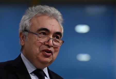 International Energy Agency (IEA) Executive Director Fatih Birol headshot on blue background.