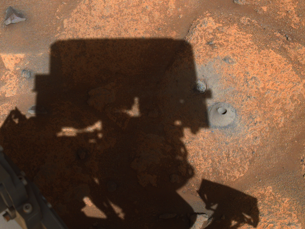 A photograph from NASA's Perseverance Mars rover showing a borehole the rover had drilled