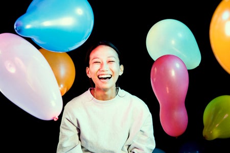 Portrait of a japanese women with colorful balloons