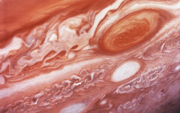 Great Red Spot Helps Explain Jupiter's Warm Upper Atmosphere