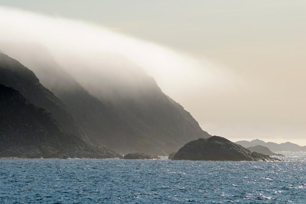 Fog above Monumental Island off Baffin Island,