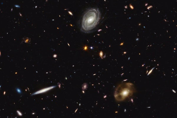An infrared image showing many galaxies filling the frame