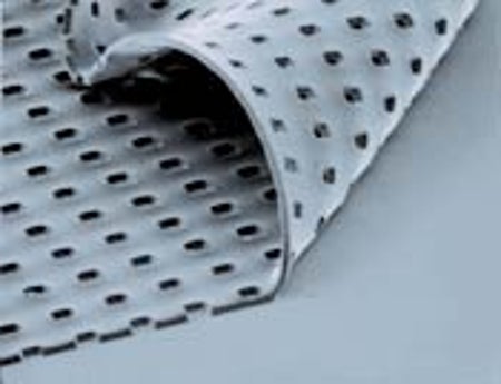 PEELING OFF a rubber sheet allows Surface Logix scientists to test how cells placed in micromolded cavities react to a drug candidate