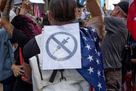 Several thousand protestors opposed to the COVID-19 vaccine and any mandates from the government to take it march through the streets on September 18, 2021 in midtown Manhattan, New York City.