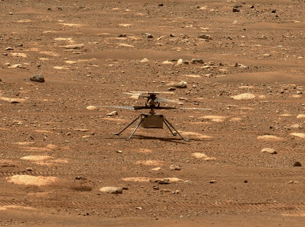 NASA's Ingenuity helicopter rests on the surface of Mars awaiting a software upgrade before it can fly.