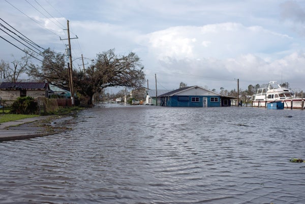 Bayou water can be seen flooding streets in Louisiana after Hurricane Ida made landfall.