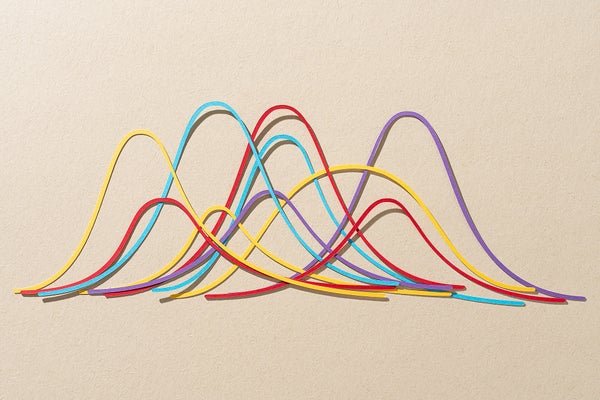 Paper Cut Craft Abstract Multiple Curve Graph on Beige Background Directly Above View