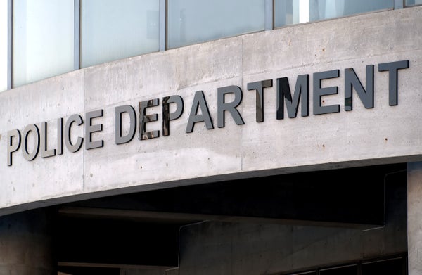 Large letters that spell Police Department on a Building