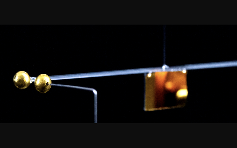 A laboratory experiment captured the pull between two minuscule gold spheres, paving the way for experiments that probe the quantum nature of gravity 