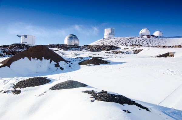 A coat of snow surrounds the Mauna Kea Observatory on the Big Island, Hawaii.