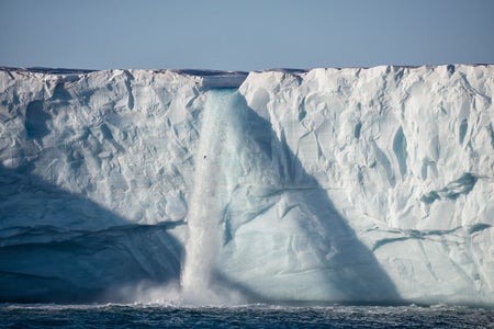 Water gushing from melting glacier