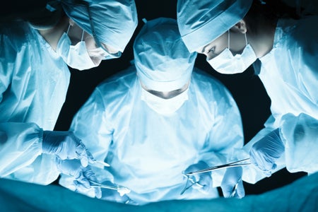 surgeons at operating table