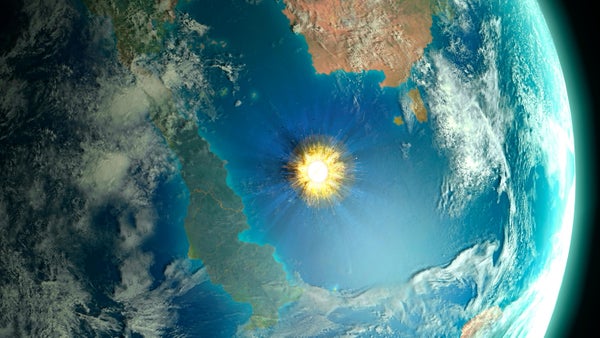 Illustration of a large asteroid colliding with Earth on the Yucatan Peninsula in Mexico.
