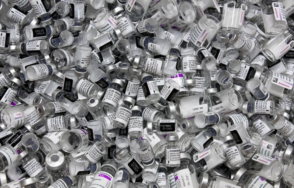 Massive pile of empty vaccine vials.