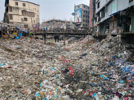 Canal choked by massive amounts of litter