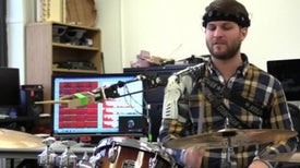 Robotic Arm Allows Three Armed Drumming