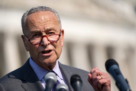 Chuck Schumer speaking at a news conference.