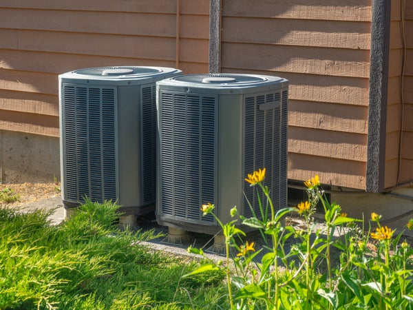 Air conditioning units outside an apartment complex