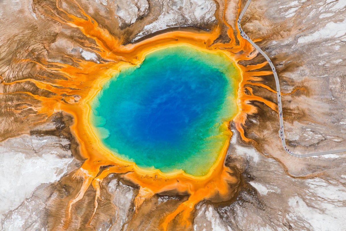 Aerial view of rainbow-colored natural spring.