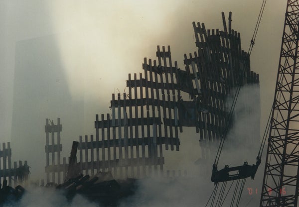 The lattice-like structure of one of the Twin Towers, exposed in the aftermath of the 9/11 attacks.