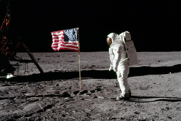 US Astronaut on surface of Moon with American flag