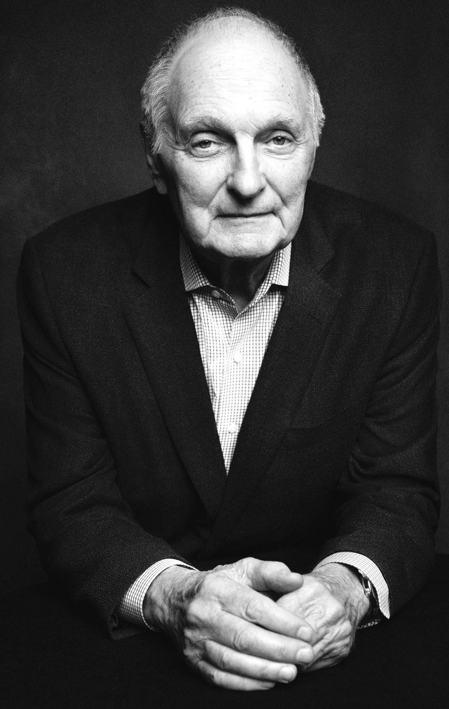 Black and white portrait of Alan Alda.