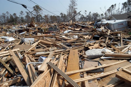 Destroyed homes in rubble.