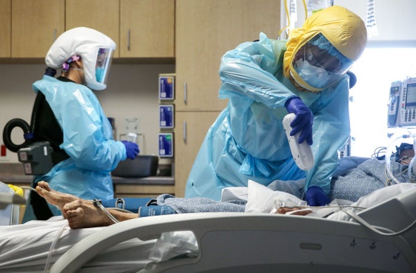 Clinicians care for a COVID-19 patient in the intensive care unit at El Centro Regional Medical Center in California's hard-hit Imperial County on July 21, 2020.