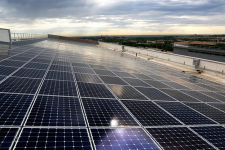 A solar array adorns a roof at the National Renewable Energy Laboratory in Golden, Colo.