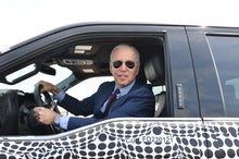 Biden Touts Electric Vehicles Amid Negotiations on Infrastructure Spending