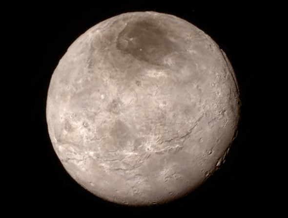 New Horizons Delivers First Close-Up Glimpse of Pluto and Charon